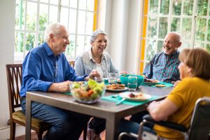 Group enjoying a meal together at the table.