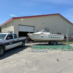 Resource Enforcement officers with the Department of Fisheries, Forestry and Agriculture recently seized a boat, motor, net and 10 Atlantic salmon following a poaching investigation. Two individuals were arrested for contravention of the Fisheries Act.