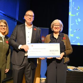Dean Holloway, Regional Vice President, Personal Banking, Newfoundland and Labrador, BMO (centre), presents Anne Chafe, CEO of The Rooms (left), and Margaret Allan, Chair of The Rooms Board of Directors with a cheque for $500,000. BMO’s generous support will enable The Rooms to refresh three BMO Travelling Edukit programs.