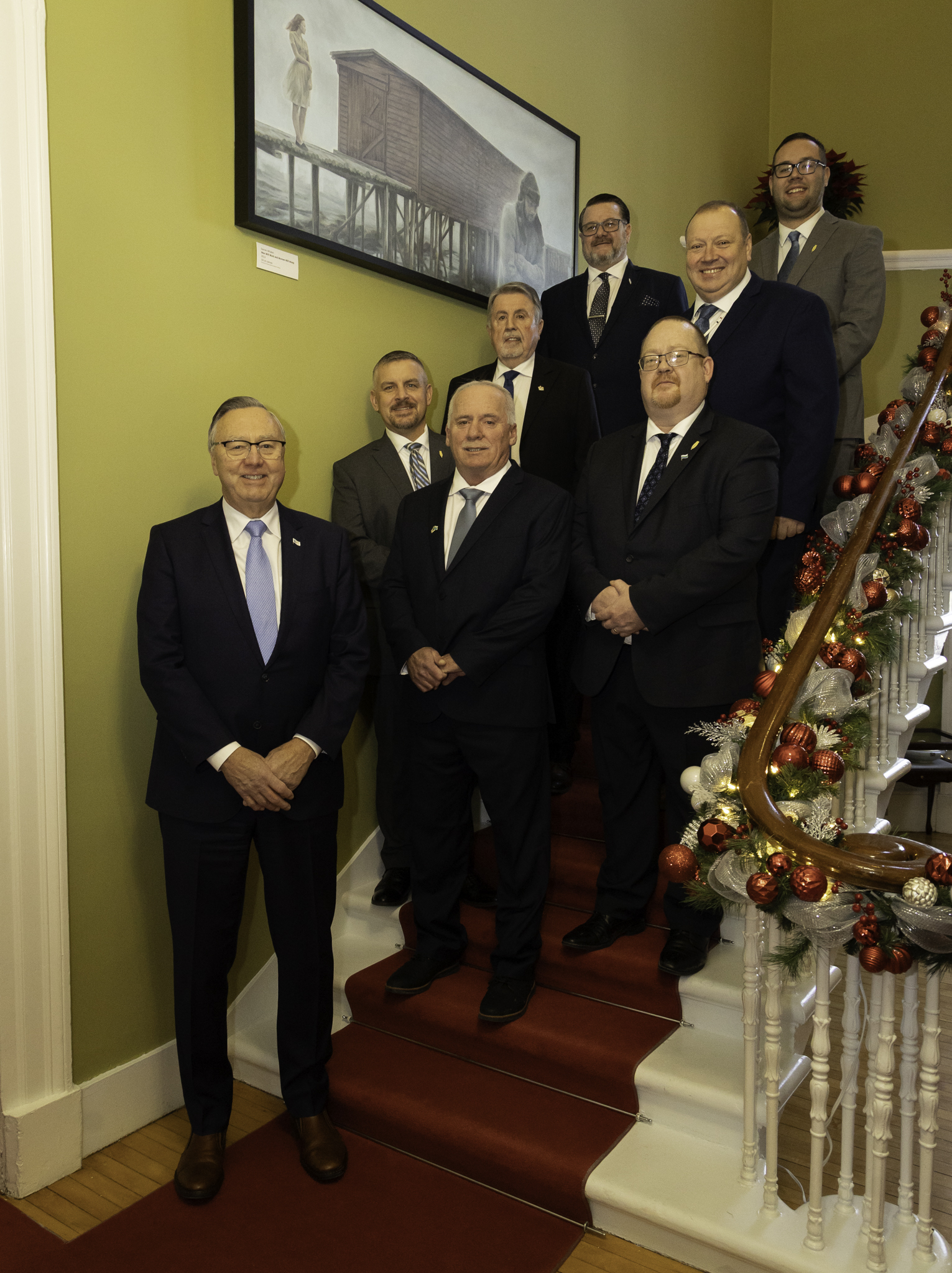 Premier Wakeham with Parliamentary Parliamentary Assistant to the Premier (MHA Riley Balsom) and Parliamentary Secretaries (MHA Jeff Dwyer, MHA Keith Russell, MHA Jim McKenna, MHA Mark Butt, MHA Hal Cormier, MHA Joseph Power).